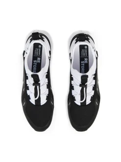 Cropp Sneakersy*Czarno-białe sneakersy z odblaskowymi detalami