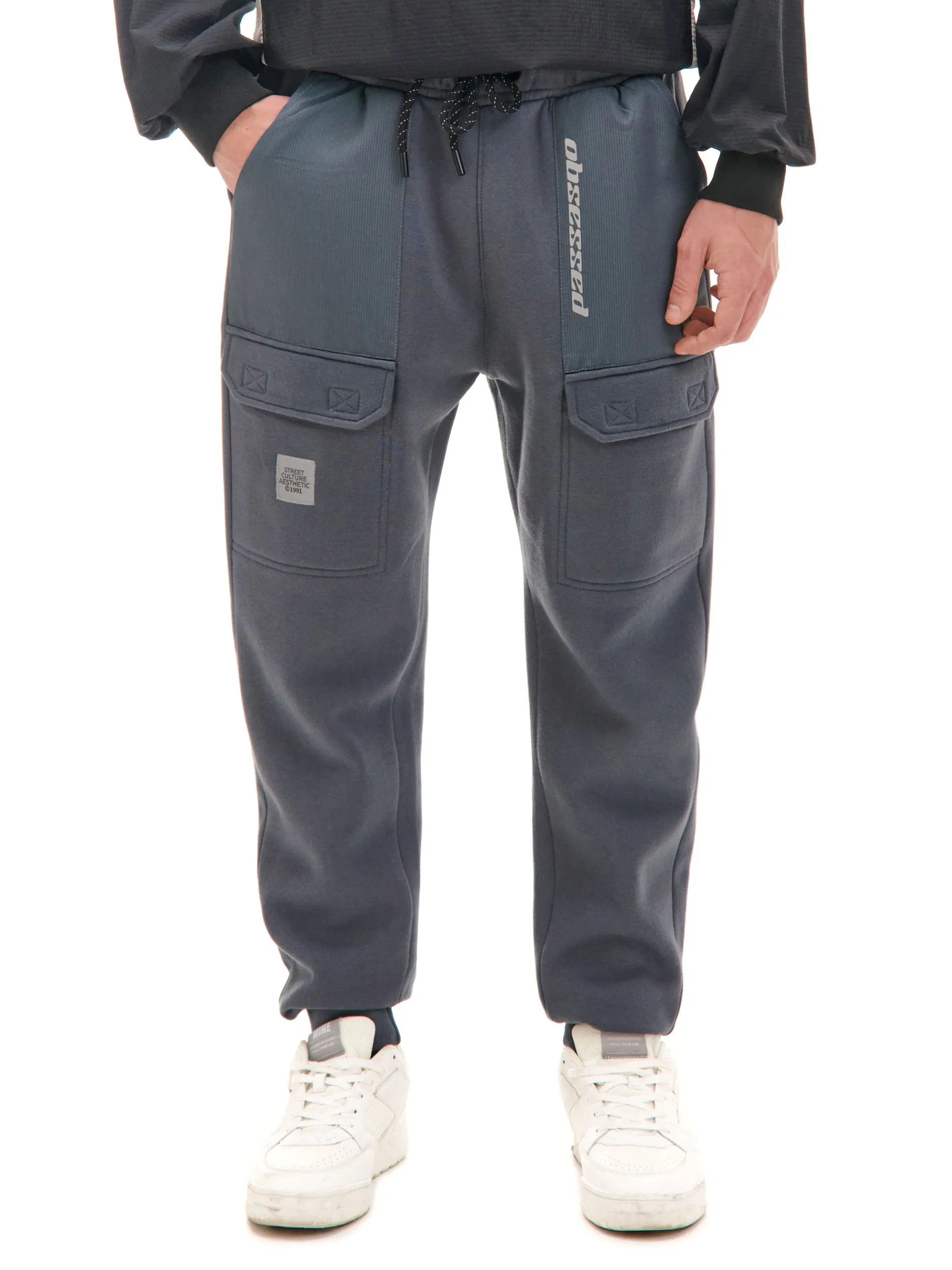 Cropp Spodnie*Dresowe joggery z efektem reflective