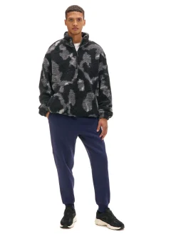 Cropp Spodnie*Granatowe dresowe joggery z nadrukiem na nogawce